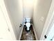 Toilet room featuring toilet and light-colored walls and tile flooring at 31 Capeside Ct, Lillington, NC 27546