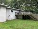 Backyard with elevated deck and stairs at 709 W Horne St, Clayton, NC 27520