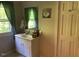 Simple bathroom with a vanity and mirror at 709 W Horne St, Clayton, NC 27520