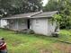 Grey house with a side yard at 709 W Horne St, Clayton, NC 27520
