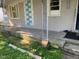 Front porch detail with decorative railing at 709 W Horne St, Clayton, NC 27520