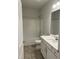 Bathroom features a shower/tub combo with a white vanity at 105 Watermelon Dr, Franklinton, NC 27525