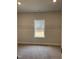 Walk-in closet featuring built-in wire shelving and a window at 105 Watermelon Dr, Franklinton, NC 27525