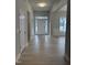 Bright entry featuring hardwood floors, transom window, and an open floor plan at 105 Watermelon Dr, Franklinton, NC 27525