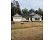 Charming one-story home with a two-car garage and beautiful landscaping in the front yard at 105 Watermelon Dr, Franklinton, NC 27525