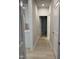 Hallway showcasing the home's open floor plan and hardwood floors at 105 Watermelon Dr, Franklinton, NC 27525