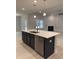 Kitchen island with a stainless steel dishwasher and a sink at 105 Watermelon Dr, Franklinton, NC 27525