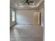 Spacious main bedroom featuring tray ceiling, recessed lights, and plush carpet at 105 Watermelon Dr, Franklinton, NC 27525