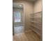 Walk-in pantry with wire shelving and window with a view at 105 Watermelon Dr, Franklinton, NC 27525