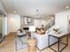 Inviting living room with a stone fireplace, modern decor, and sliding door access at 144 W Beech Slope Ct, Chapel Hill, NC 27517