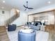 Open-concept living space featuring hardwood floors, neutral colors, and a smooth transition to the kitchen at 144 W Beech Slope Ct, Chapel Hill, NC 27517