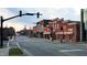 Charming downtown street featuring local businesses with brick facades and decorative awnings at 417 E Moore St, Apex, NC 27502