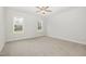 Spacious bedroom with carpet flooring and ceiling fan at 49 Lupin Dr, Smithfield, NC 27577