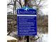 Lillington Community sign with kayak/canoe launch information and hours of operation at 55 Streamline Ct, Lillington, NC 27546