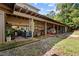 Large barn structure featuring open storage for equipment and supplies, offering ample space and functionality at 1021 Dimmocks Mill Rd, Hillsborough, NC 27278