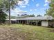 Extensive barn with covered storage, providing ample space for equipment and workshop areas at 1021 Dimmocks Mill Rd, Hillsborough, NC 27278