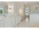 Bright bathroom featuring double vanity, modern fixtures, and a glass-enclosed shower at 60 Citori Ct, Pittsboro, NC 27312
