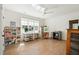 Bright art studio with hardwood floors, a ceiling fan, and a large window with backyard views at 60 Citori Ct, Pittsboro, NC 27312