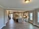 Open concept kitchen with island, view into living and dining areas at 1055 Fairhaven Dr # 56, Mebane, NC 27302