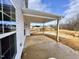 Covered patio overlooking a pond, providing a peaceful outdoor space at 1055 Fairhaven Dr # 56, Mebane, NC 27302