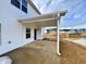 Covered patio with pond views, offering outdoor relaxation at 1055 Fairhaven Dr # 56, Mebane, NC 27302