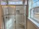 Walk-in shower with tile surround and built-in seat at 1055 Fairhaven Dr # 56, Mebane, NC 27302