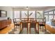 Stylish dining room with modern furniture and large windows for natural light at 621 Damascus Church Rd, Chapel Hill, NC 27516