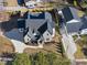 Stunning aerial view of the property showcasing the architectural design, landscaping, and desirable neighborhood setting at 701 Dartmouth Rd, Raleigh, NC 27609