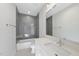 Bright bathroom featuring a vanity and tiled shower at 701 Dartmouth Rd, Raleigh, NC 27609