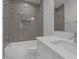 Bathroom showcasing a bathtub with gray tiled walls, quartz counters and modern fixtures at 701 Dartmouth Rd, Raleigh, NC 27609