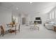 Expansive living room boasts ample seating, a dining area, and a serene atmosphere at 701 Dartmouth Rd, Raleigh, NC 27609