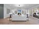 Comfortable living room features a fireplace, built-in shelving, and a large sliding door to the backyard at 701 Dartmouth Rd, Raleigh, NC 27609