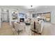 Cozy living room with a fireplace, built-in shelving, and a sliding door to the patio at 701 Dartmouth Rd, Raleigh, NC 27609