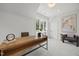 Bright office features a wooden desk, large windows, and comfortable seating at 701 Dartmouth Rd, Raleigh, NC 27609