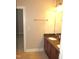 Bathroom featuring a double vanity with granite counters and neutral wall colors at 7250 Nc 751 Hwy # 2101, Durham, NC 27707