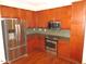 Well-equipped kitchen with stainless steel appliances and wood cabinetry at 7250 Nc 751 Hwy # 2101, Durham, NC 27707