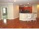 Open kitchen with stainless appliances and bar seating at 7250 Nc 751 Hwy # 2101, Durham, NC 27707