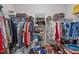 Large walk-in closet with ample hanging space and shelves at 108 Cullen Ct, Clayton, NC 27520