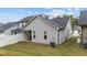 Rear view of house with private patio and yard at 108 Cullen Ct, Clayton, NC 27520