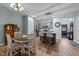 Modern kitchen features island with seating, stainless steel appliances, and ample cabinet space at 108 Cullen Ct, Clayton, NC 27520
