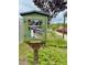 Little Free Library filled with books for community members at 108 Cullen Ct, Clayton, NC 27520