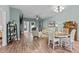 Spacious living room with hardwood floors, comfortable seating and access to kitchen at 108 Cullen Ct, Clayton, NC 27520