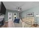 Open living room with neutral decor, fireplace, and access to backyard at 108 Cullen Ct, Clayton, NC 27520
