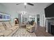 Living room with neutral color palette, comfortable seating, and open concept floorplan at 108 Cullen Ct, Clayton, NC 27520