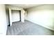 Carpeted bedroom includes a closet for ample storage space at 321 Hopewell Branch Ct, Smithfield, NC 27577