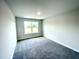 Bright bedroom with a window allowing ample natural light at 321 Hopewell Branch Ct, Smithfield, NC 27577