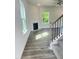 Inviting living room with modern fireplace and hardwood floors at 321 Hopewell Branch Ct, Smithfield, NC 27577