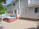 Backyard with a deck, spa and brick patio, great for entertaining at 102 Preston Pines Dr, Cary, NC 27513
