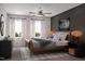 Comfortable primary bedroom with a ceiling fan, natural light, and stylish décor at 1206 Holding Village Way, Wake Forest, NC 27587