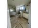 Double vanity bathroom with a large shower at 1528 Maelyn Way, Fuquay Varina, NC 27526